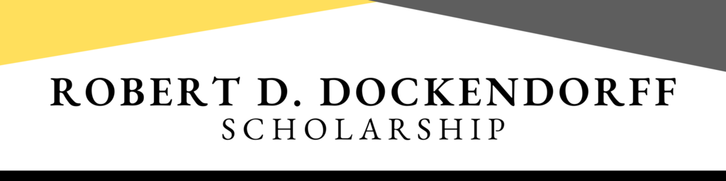 White background with yellow and dark gray triangles in the upper two corners. "ROBERT D. DOCKENDORFF SCHOLARSHIP" is written in black text.