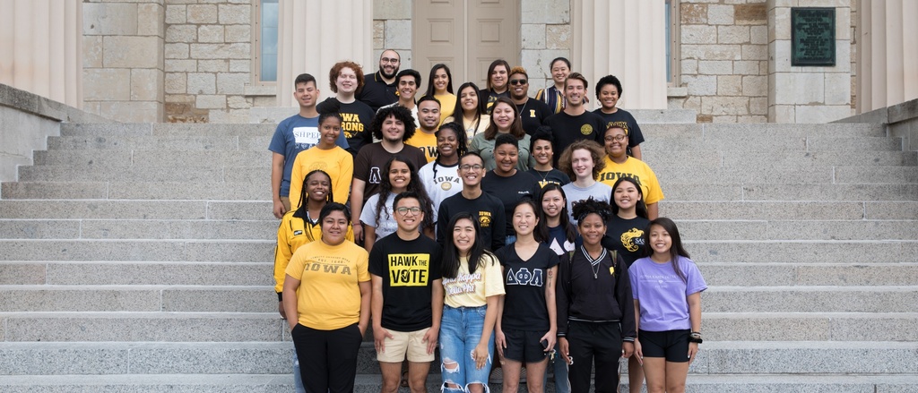 Students standing on the steps of the old capitol